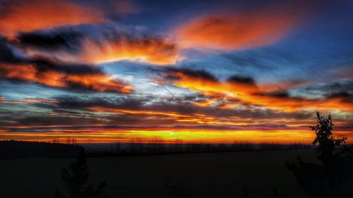 Scenic view of dramatic sky during sunset