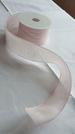 High angle view of ribbon on table