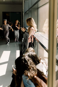 Female students in school corridor during lunch break