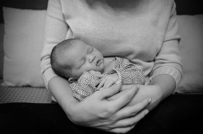 Cute baby sleeping on bed