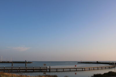 Scenic view of sea against clear sky