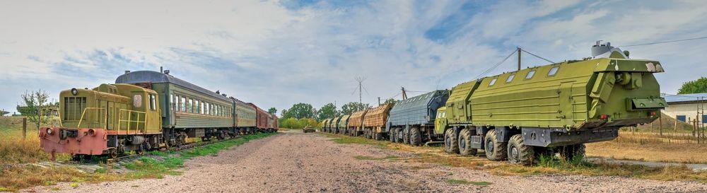 Train on railroad track against sky