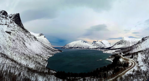 Scenic view of snowcapped mountains against sky