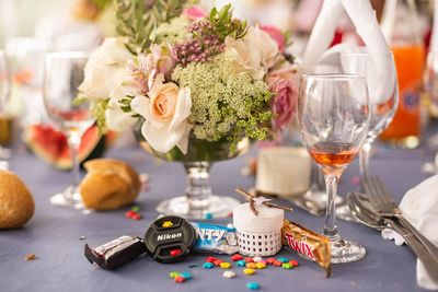 Close-up of various flowers in vase on table