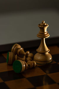 Close-up of chess pieces on table