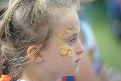 Close-up of girl with painted face