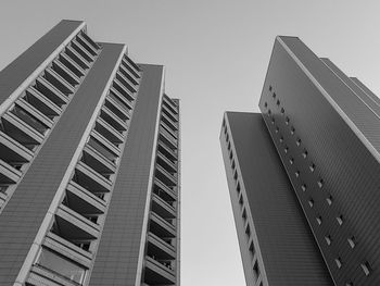 Low angle view of modern buildings against clear sky