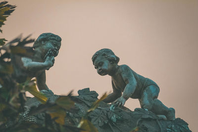 Low angle view of statue against clear sky