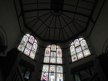 Low angle view of glass ceiling