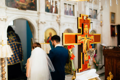 Rear view of people at temple
