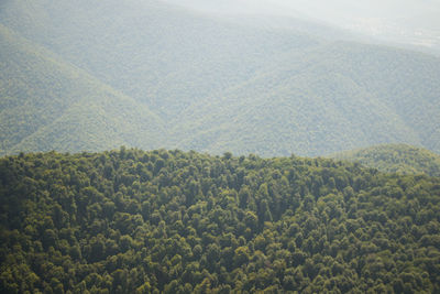 Mountain landscape in georgia, clouds and blue sky. mountain range. sunset time.