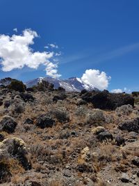 Low angle view of rocks against sky