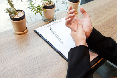 High angle view of coffee cup on table