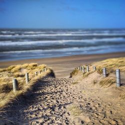 Scenic view of beach against sky