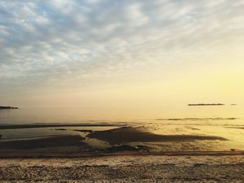 Scenic view of sunset over sea