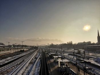 Railroad tracks against clear sky