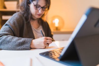 White woman working from home