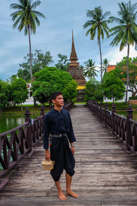 Full length of man walking in temple