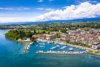 High angle view of city by sea