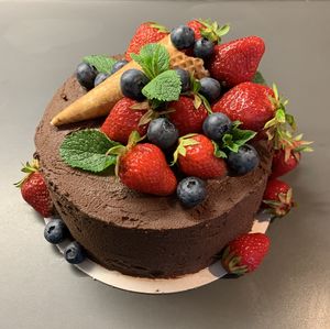 Yummy chocolate cake with berries