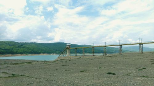 Scenic view of bay against sky