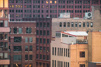 Office buildings in the city at sunset. urban aerial architecture in west loop, chicago, usa.