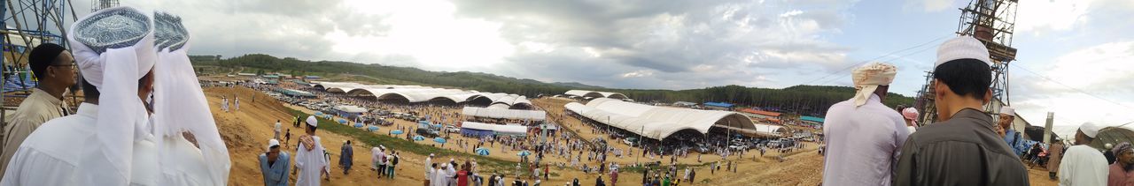 Panoramic view of clothes hanging against sky