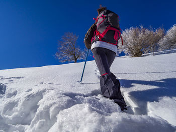 Winter trekking scene in the italian alps