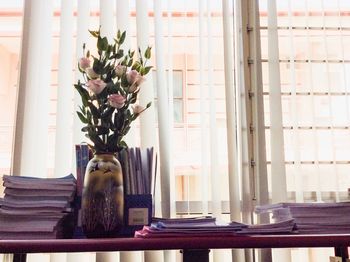 Close-up of vase on table at home