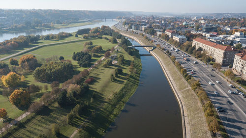 High angle view of river amidst buildings in city