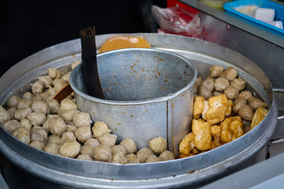 Street food that is sold by way of using a motor that is modified with a pan