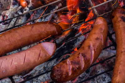 Close-up of meat on barbecue grill