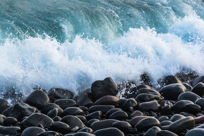 Waves splashing on rocks