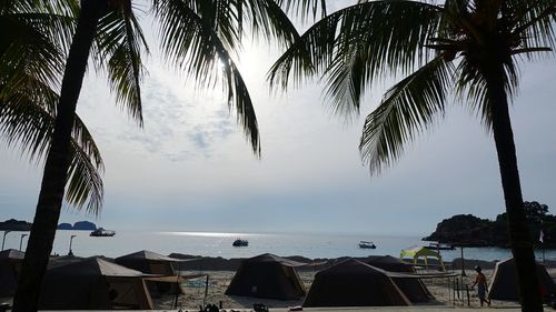 Scenic view of beach against sky during sunset