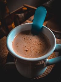 Close-up of coffee cup on table