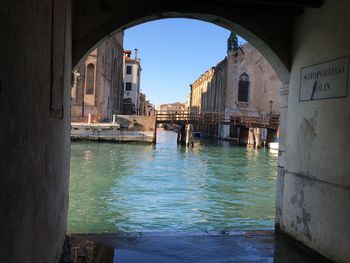 View of buildings and canal in city