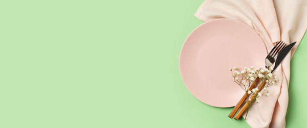 Close-up of woman hand against white background