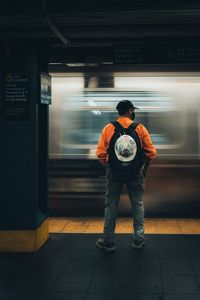 Blurred motion of train at railroad station
