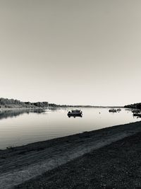 Scenic view of lake against clear sky