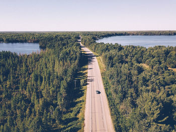 High angle view of plants by river against clear sky