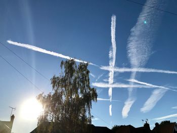 Low angle view of vapor trail against sky