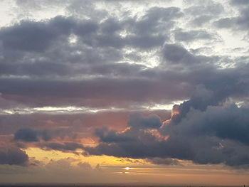 Scenic view of dramatic sky during sunset