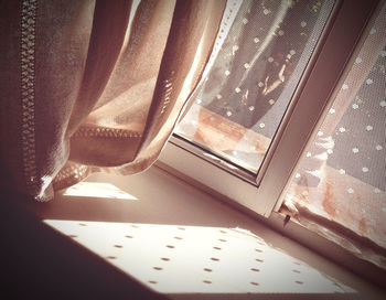 High angle view of curtain on window at home