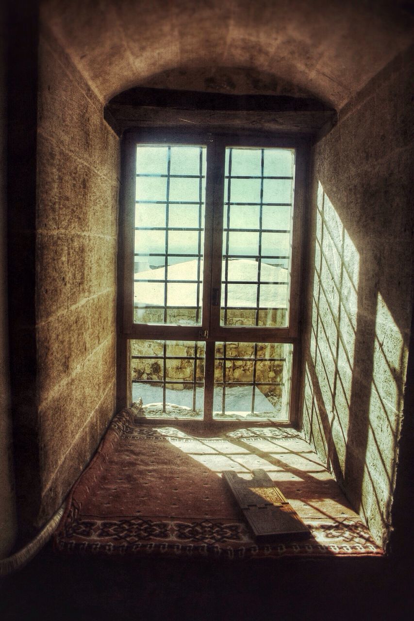 indoors, window, architecture, glass - material, built structure, transparent, interior, day, abandoned, house, door, no people, empty, sunlight, home interior, flooring, absence, glass, open, old