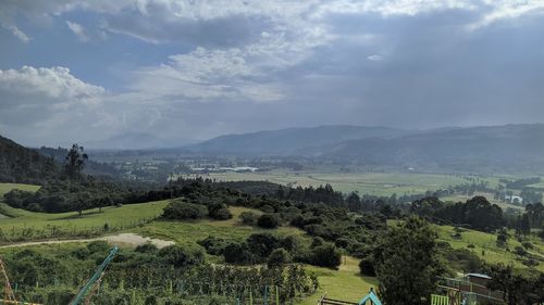 High angle view of trees on field against sky