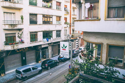 High angle view of street amidst buildings in city