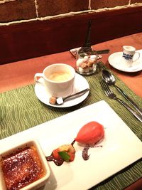 Close-up of coffee cup on table