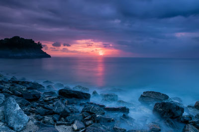 Scenic view of sea against sky during sunset