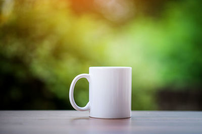 Close-up of coffee cup on table