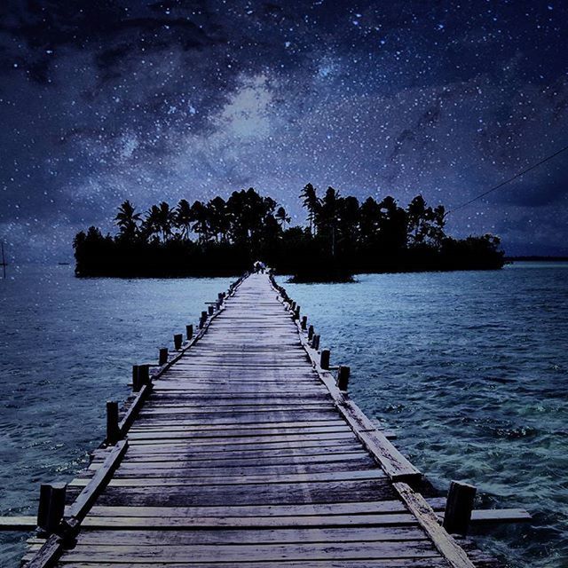 water, tranquil scene, tranquility, sky, scenics, beauty in nature, pier, tree, nature, the way forward, lake, night, jetty, sea, idyllic, wood - material, dusk, outdoors, no people, non-urban scene